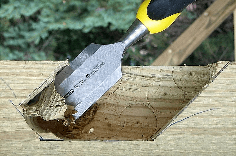 Cutting wood with Chisel