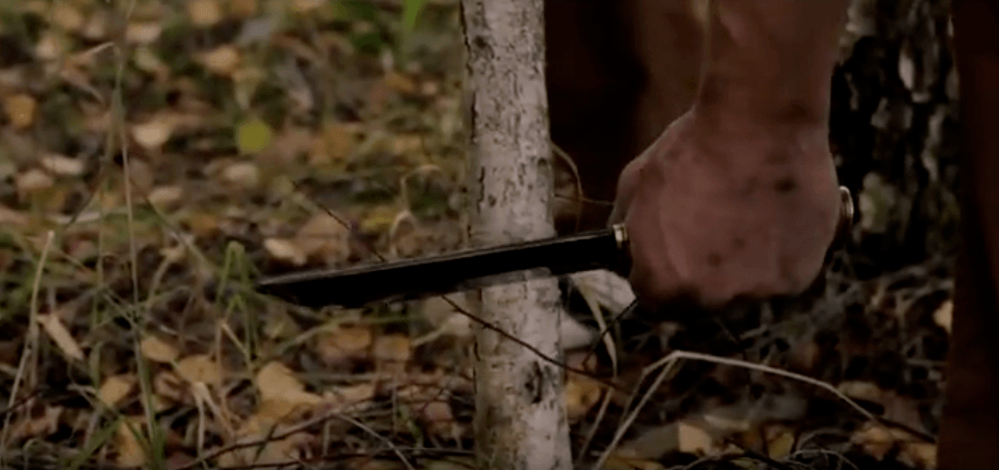woodcutting with a  sharp knife